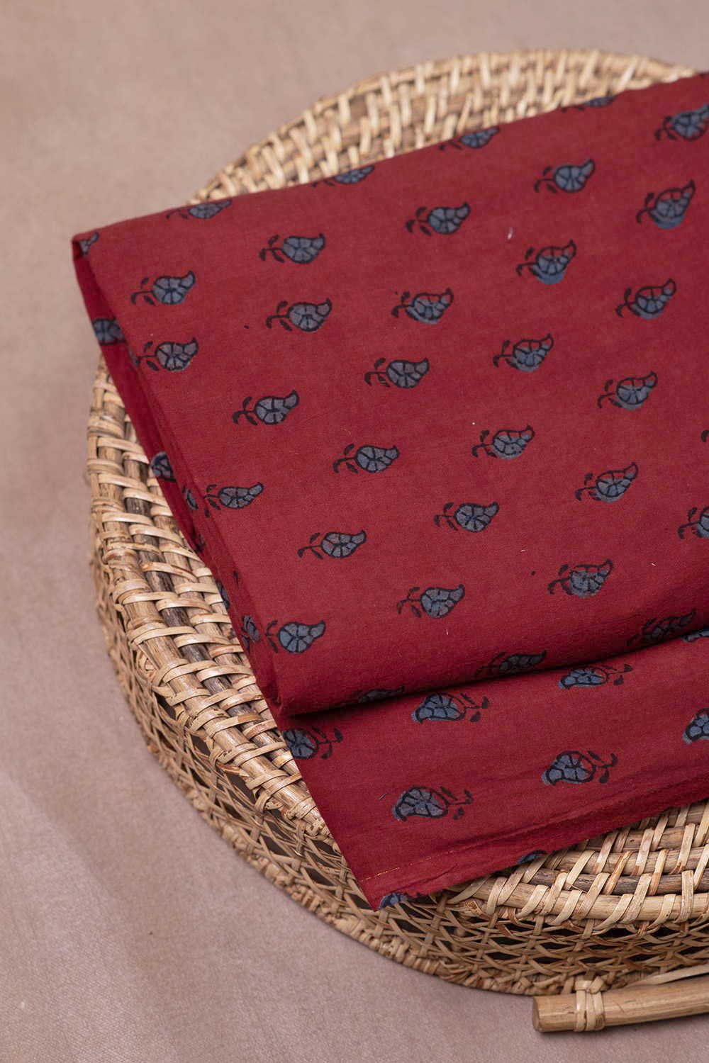 Indigo Buttas on Maroon Ajrak Cotton Fabric