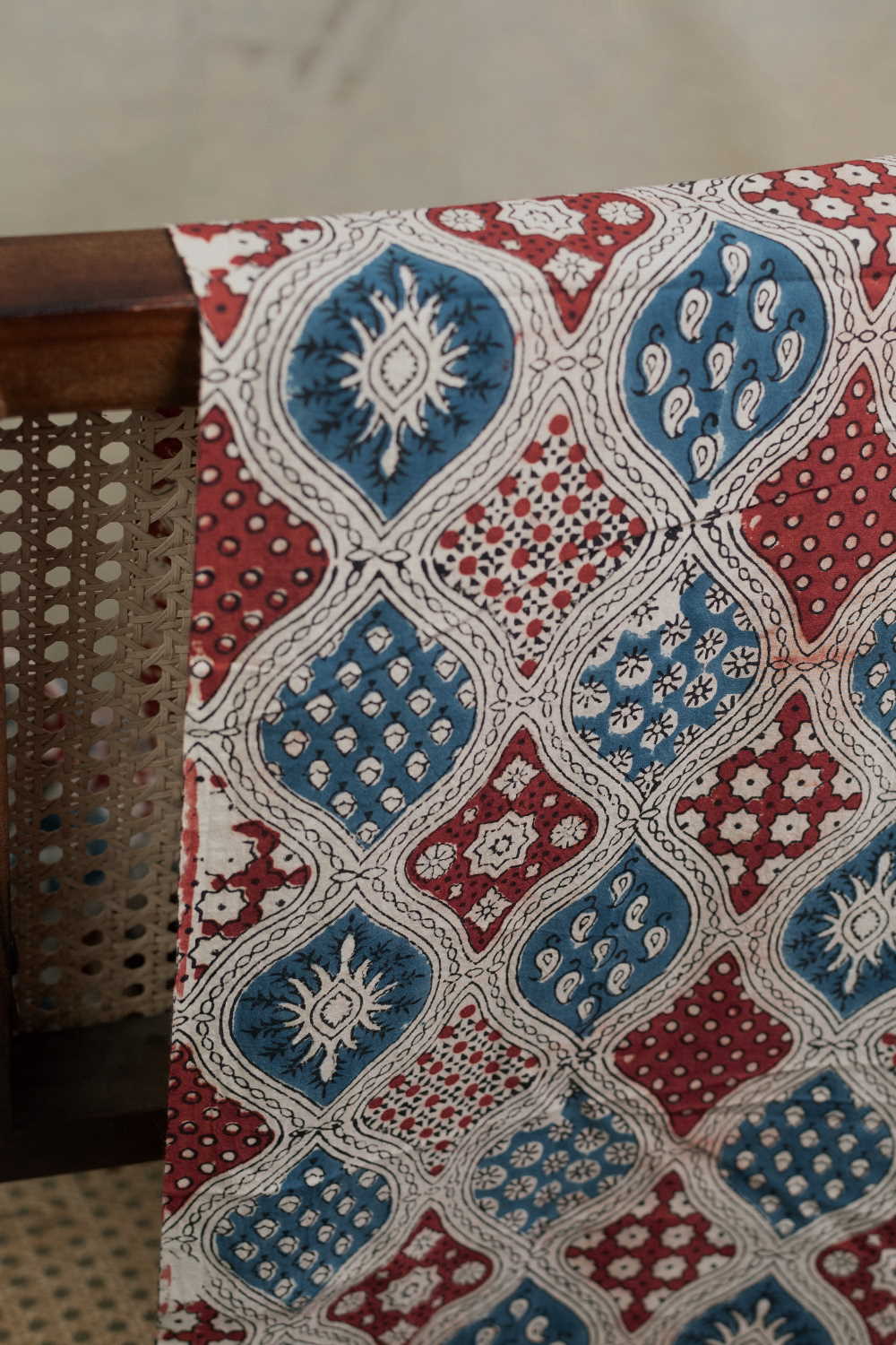 Colored Motifs on Cream Ajrak Cotton Fabric