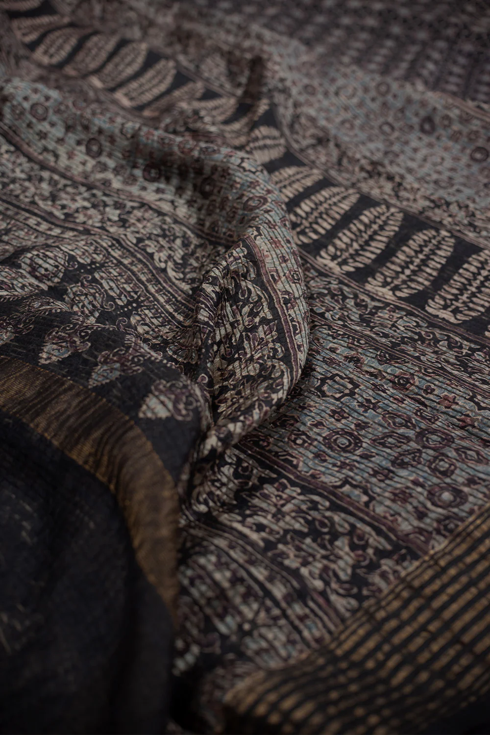 Motifs on Black Block Printed Ajrak Silk Saree - Image 3