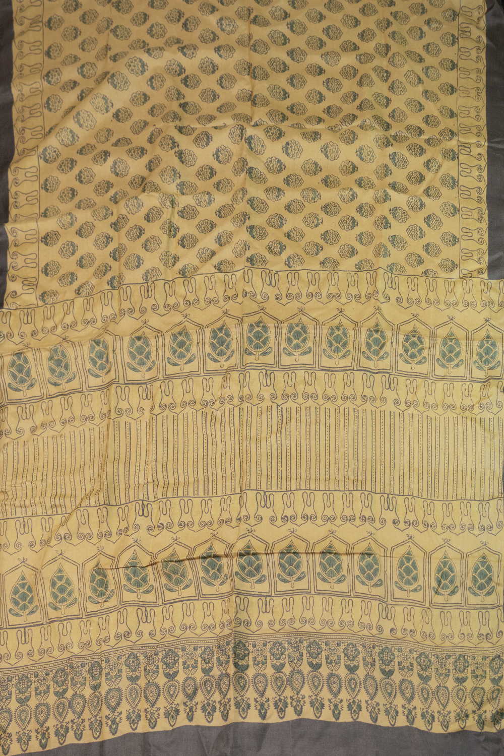 Buttas on Subtle yellow Ajrak Tussar Silk saree - Image 2