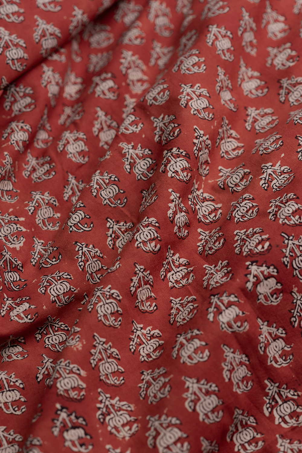 Buttas on Maroon Bagru Cotton Fabric - Image 3