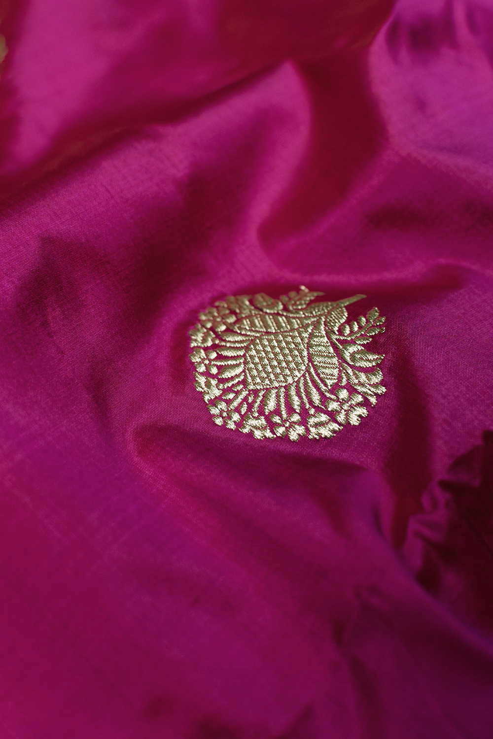 Traditional Motifs on Hot Pink Banarasi Silk Fabric