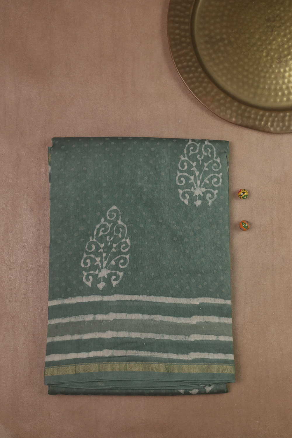 Motifs on Green Block Printed Silk Cotton saree