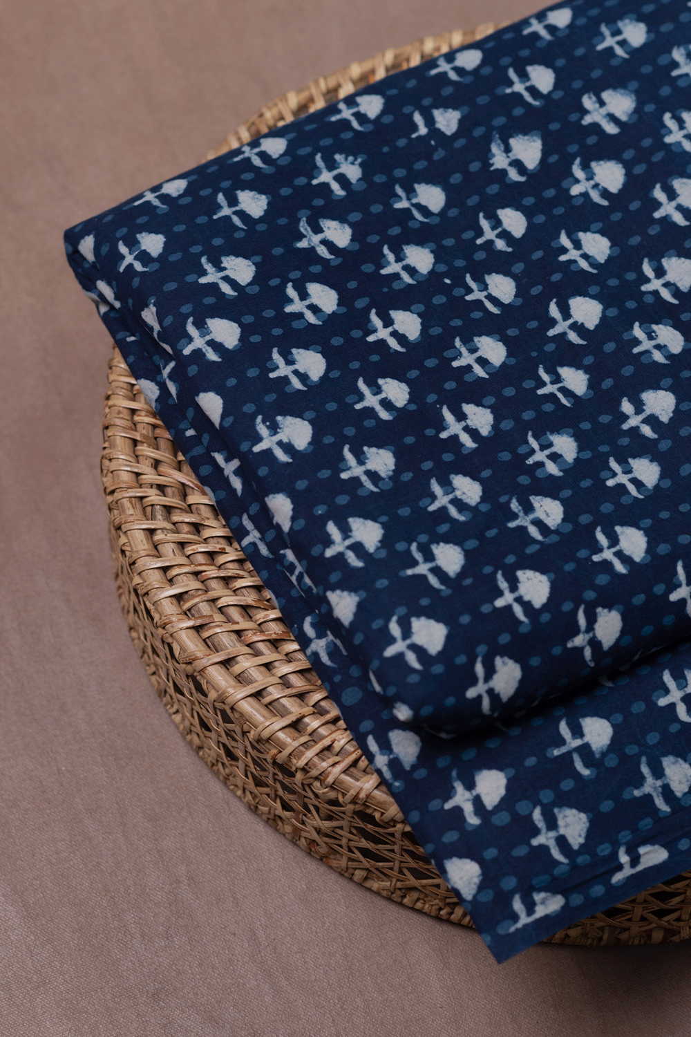 Cream Buttas on Indigo Dabu Cotton Fabric