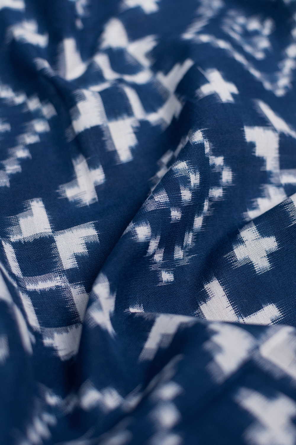 Cream Pattern on Blue Telia Rumal Ikat Cotton Fabric - Image 2