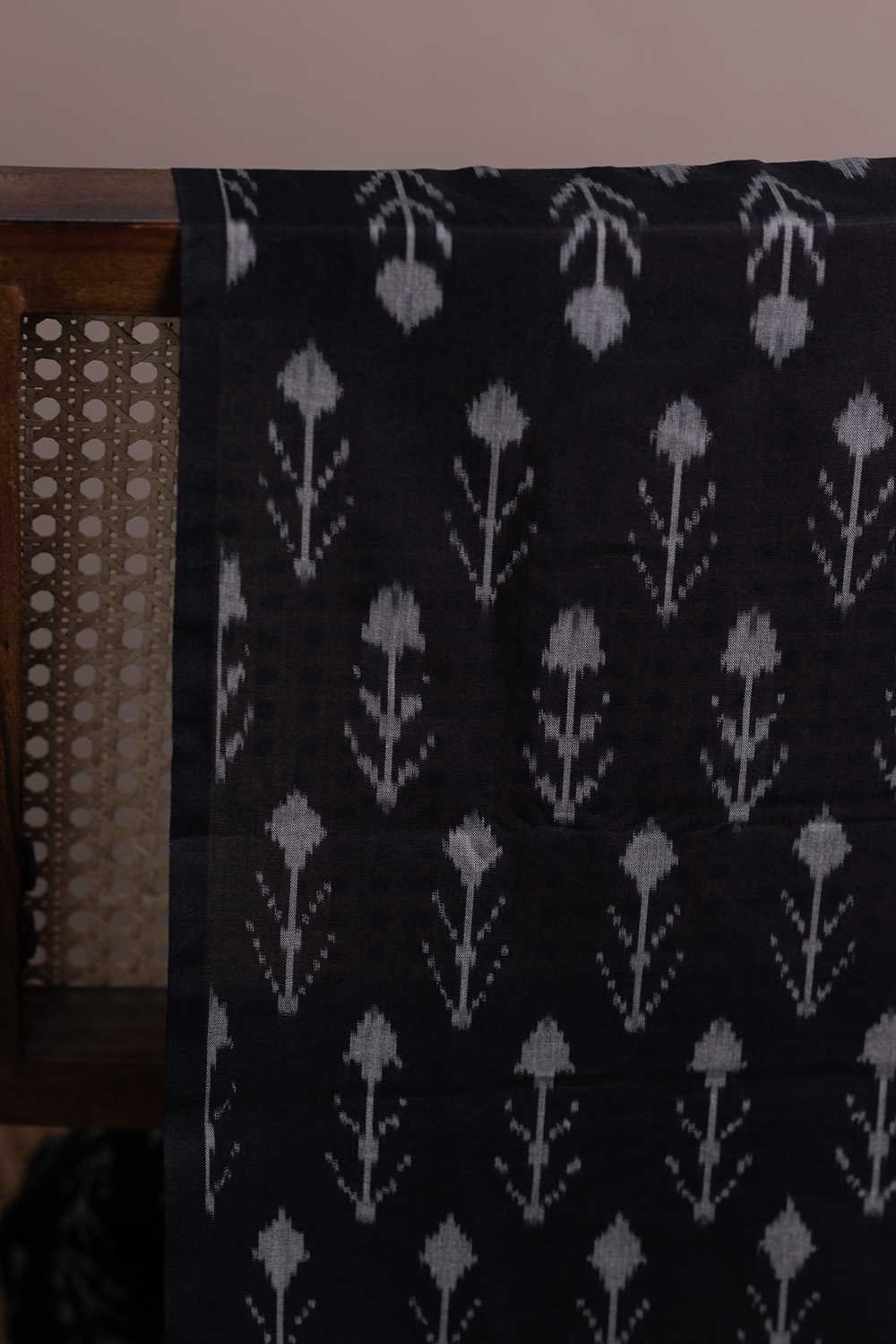 Buttas on Pitch Black Mercerized Ikat Cotton Fabric