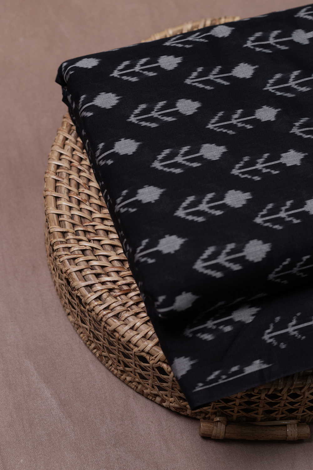 Buttas on Pitch Black Mercerized Ikat Cotton Fabric - Image 3