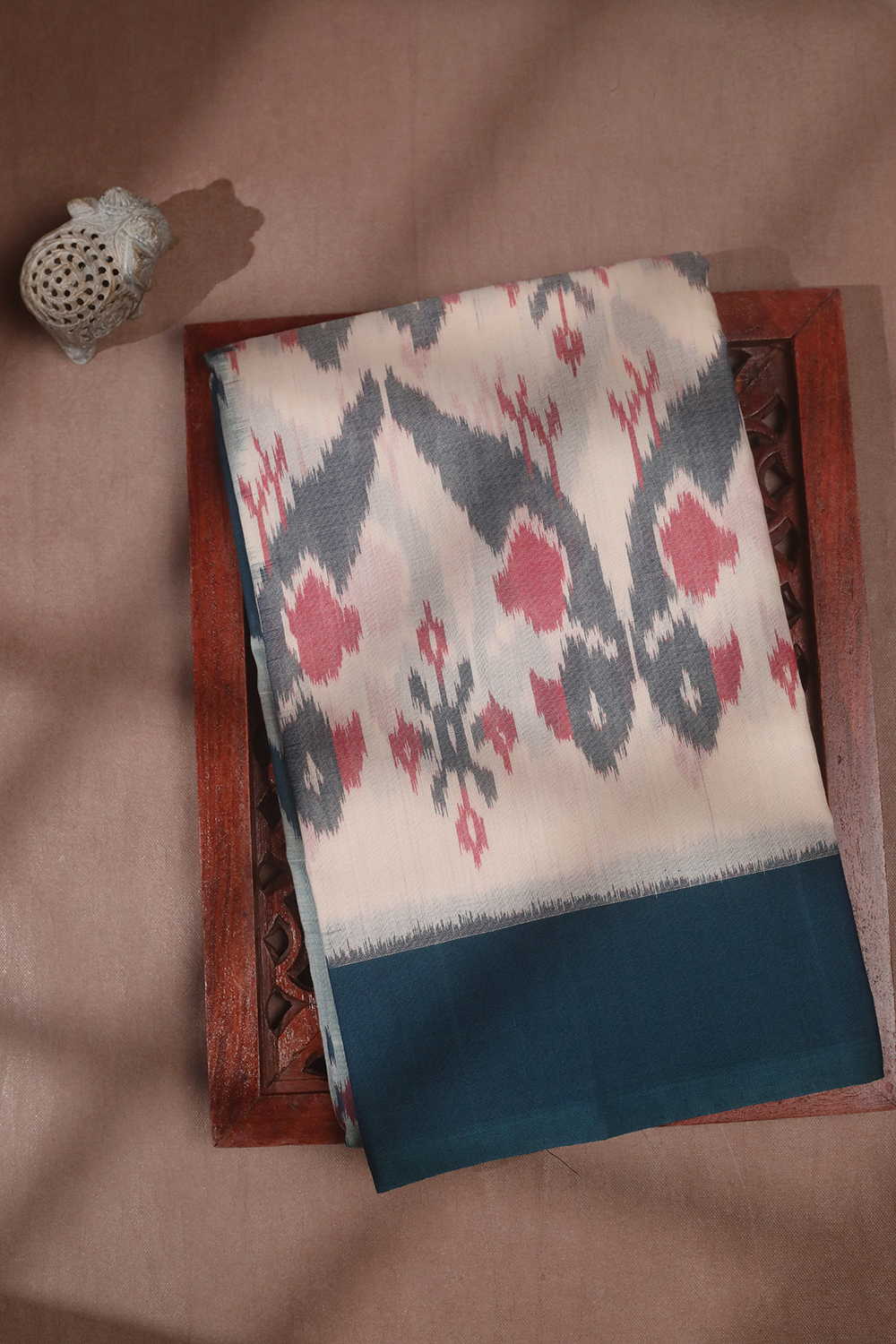 Patterned on Cream Ikat Cotton saree