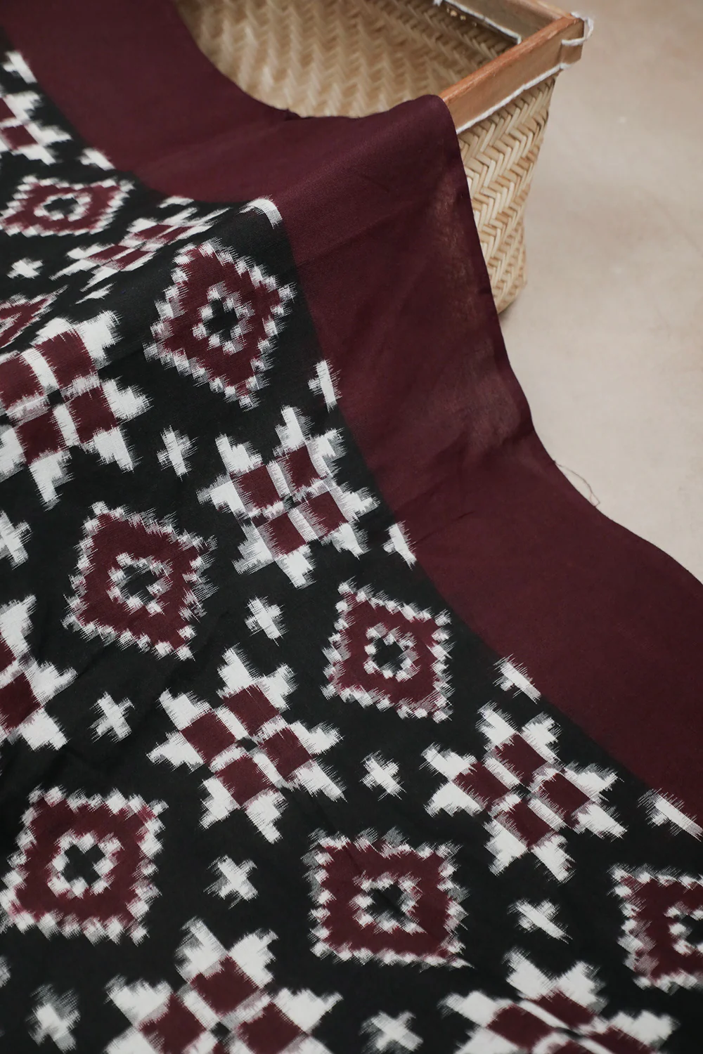 Maroon Motifs on Black Telia Rumal Ikat Fabric