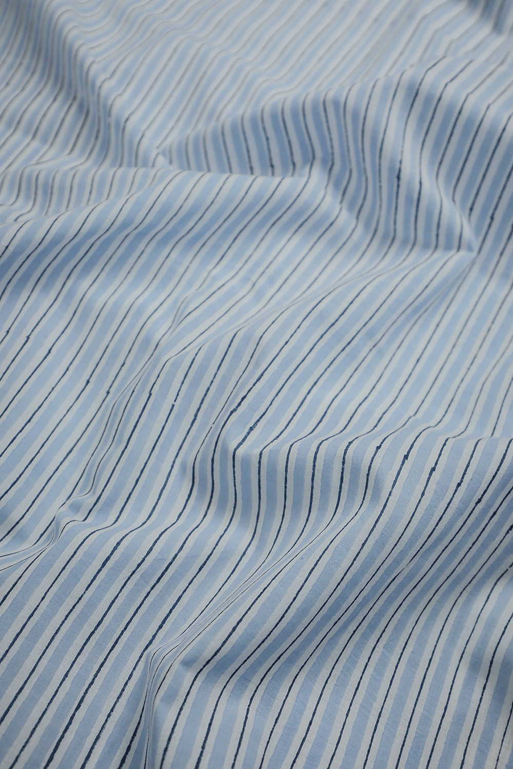 Blue Stripes on Cream Sanganeri Cotton Fabric - Image 2