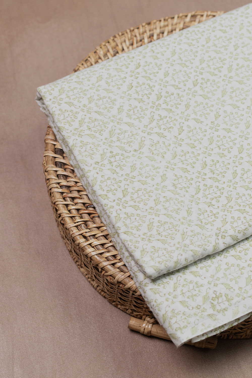 Green Designs on Cream Sanganeri Cotton Fabric